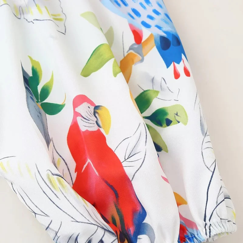 Vestido Carol: A Natureza em Cada Detalhe 🌿🦜